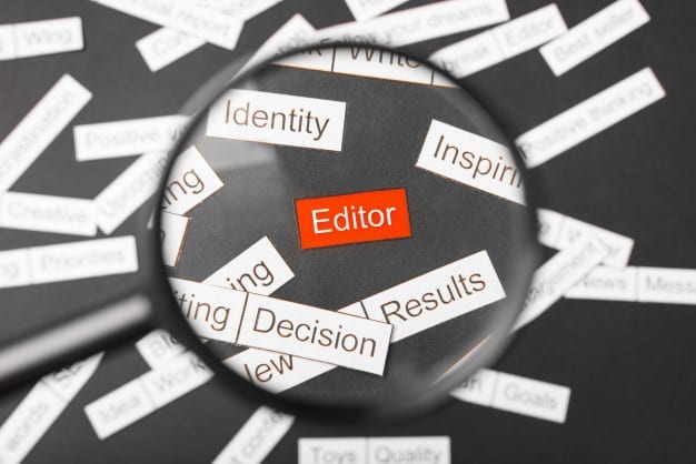 magnifier-glass-red-inscription-editor-cut-out-paper
